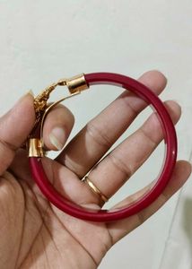 Brand new Gold Bangle with Red Accents