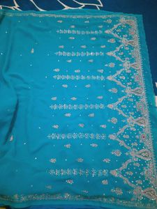 Elegant Turquoise Embroidered Saree