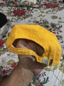 Amoldo Bassini Yellow Cap
