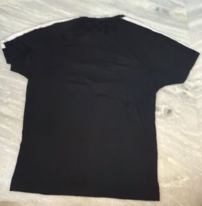 Solid black tshirt by workout brand RMDY.
