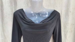 Elegant Black Dress with Embellished Sleeves