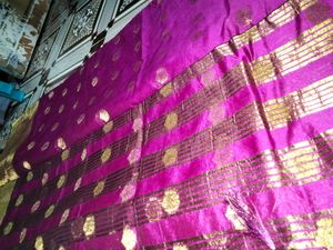 Vibrant Purple Saree with Gold Motifs