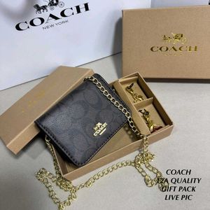 Coach Wallet sling n charm in box packing