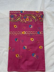 Pink embroidered fabric.