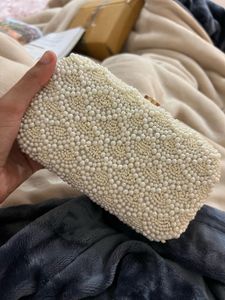 white pearl clutch
