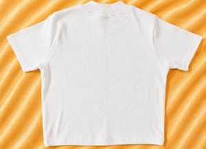 white graphic crop top