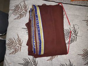 Elegant Brown Saree with Intricate Border