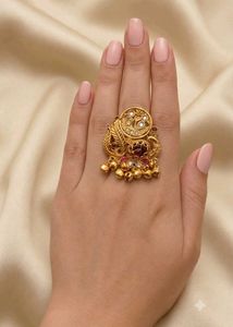 Exquisite Gold Toned Ring with Bells