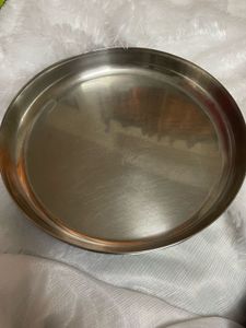 2 heavy steel dinner plates
