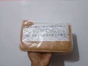 A Brand New Tan Wallet