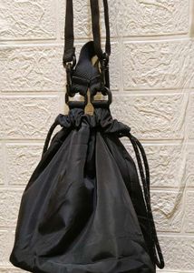 FILA STUDIO Drawstring Sling Bag