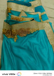 Stunning Teal Saree with Gold Embellishments