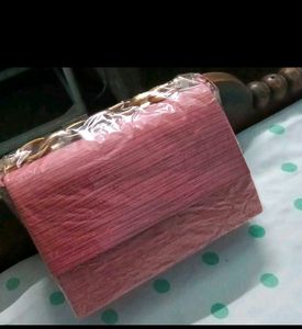 Chic Coral Clutch with Gold Chain