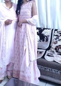 Pink naira Suit