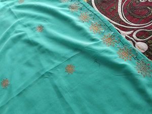Elegant Teal Embroidered Saree