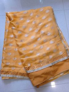 Elegant Yellow Saree with Silver Motifs