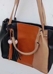 Stylish Colorblock Handbag with Tassel Charm