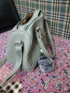 Stylish Light Green Handbag with Charm