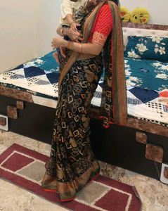 Elegant Printed Black Saree with Red Blouse