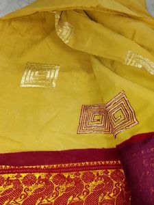 Beautiful Yellow Saree with Red Border
