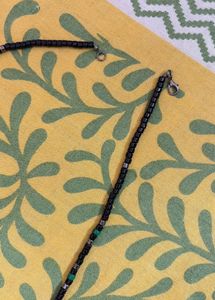 Black Beaded Necklace with Green Accents
