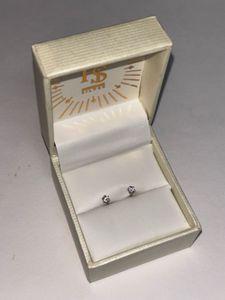 92.5% sterling sliver studs with certificate