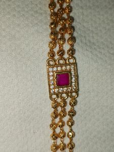 Elegant Gold and Pink Stone Bracelet