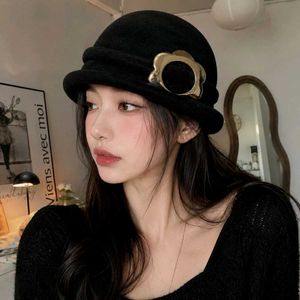 Chic black Cloche Hat with Gold Flower Accent
