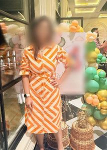 Vibrant Orange & White Striped Midi Dress
