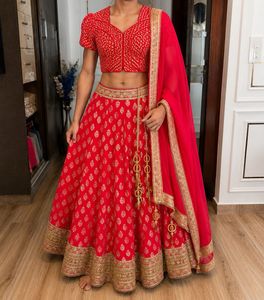 Vibrant Red Embroidered Lehenga Choli