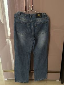 Distressed Blue Denim Jeans