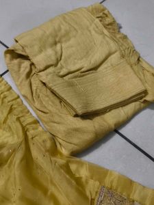 Elegant Yellow Kurta Set with Intricate Embroidery