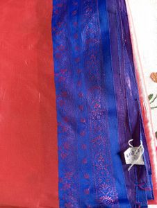 Vibrant pink orange Saree with Blue Border