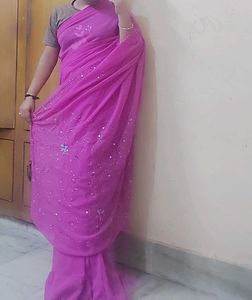 Vibrant Pink Saree with Subtle Embellishments