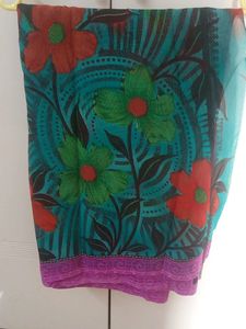 Nice saree with flowers design.