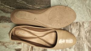 Elegant Nude Wedges
