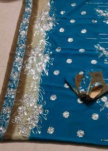 Stunning Teal Blue Saree with Silver Embellishment