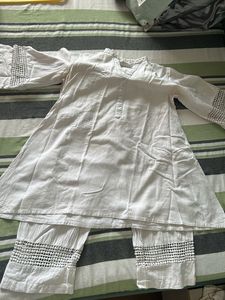 Elegant White Kurta Set with Intricate Detailing