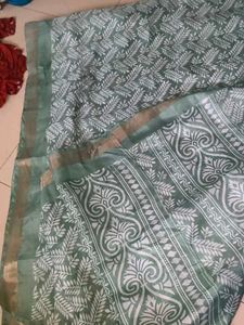 Elegant Green Saree with White Leaf Print