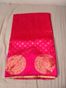 Vibrant Pink Saree with Gold Motifs