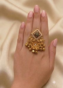 Exquisite Gold Toned Ring with Bells