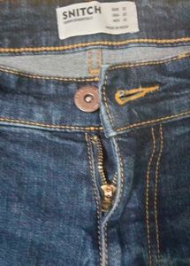Distressed Blue Denim Jeans