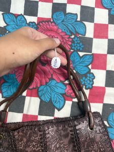Elegant Embossed Floral Handbag