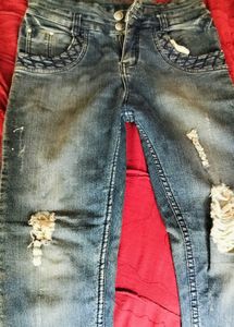 Distressed Blue Denim Jeans