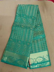 Green Embossed Soft Silk Saree