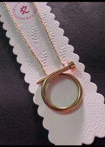 Elegant Gold Nail Ring Pendant Necklace
