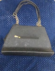 Chic Black Handbag with Bow Detail