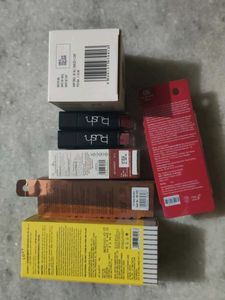 DK sunscreen , mamaearth lipstick, swiss beauty ey