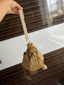 Elegant Gold Embellished Potli Bag