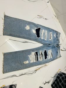 Distressed Blue Denim Jeans